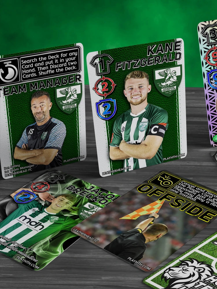 Home Team Heroes trading card game featuring Leatherhead FC Team Manager Ian Selley, Jacob Breckon and Kane Fitzgerald, player cards with ability icons and team branding