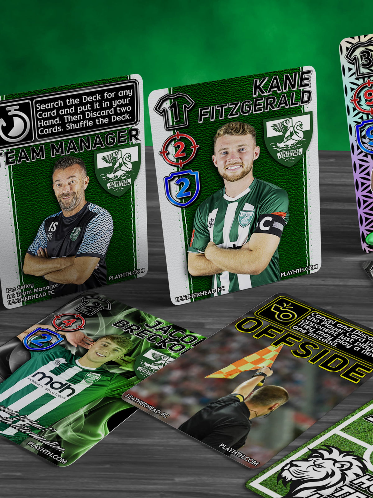 Football card game showing variety of Leatherhead FC player cards, team manager card, and tactical event cards with authentic photos
