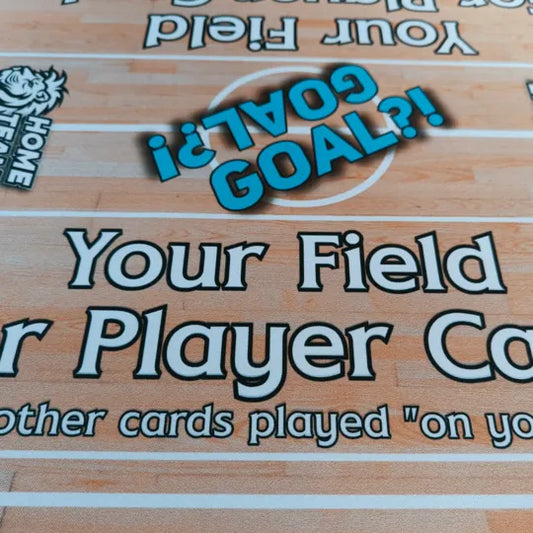 Close-up of the goal area and player field text on Home Team Heroes futsal playmat with wood-style indoor court design.