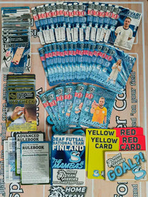 Mambas Futsal Team Deck contents laid out, including player cards, foils, and tactics from Home Team Heroes.