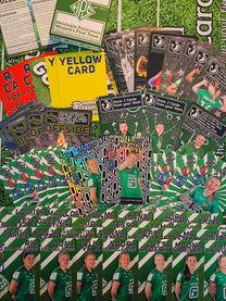 HPS Helsinki Team Deck contents showing player cards, event cards, referee cards, rulebooks and premium foil cards spread on table.