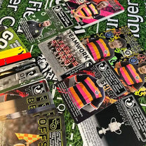 Wanderers FC Team Deck cards spread out on pitch-themed playmat, showing players, tactics and rare foil elements.